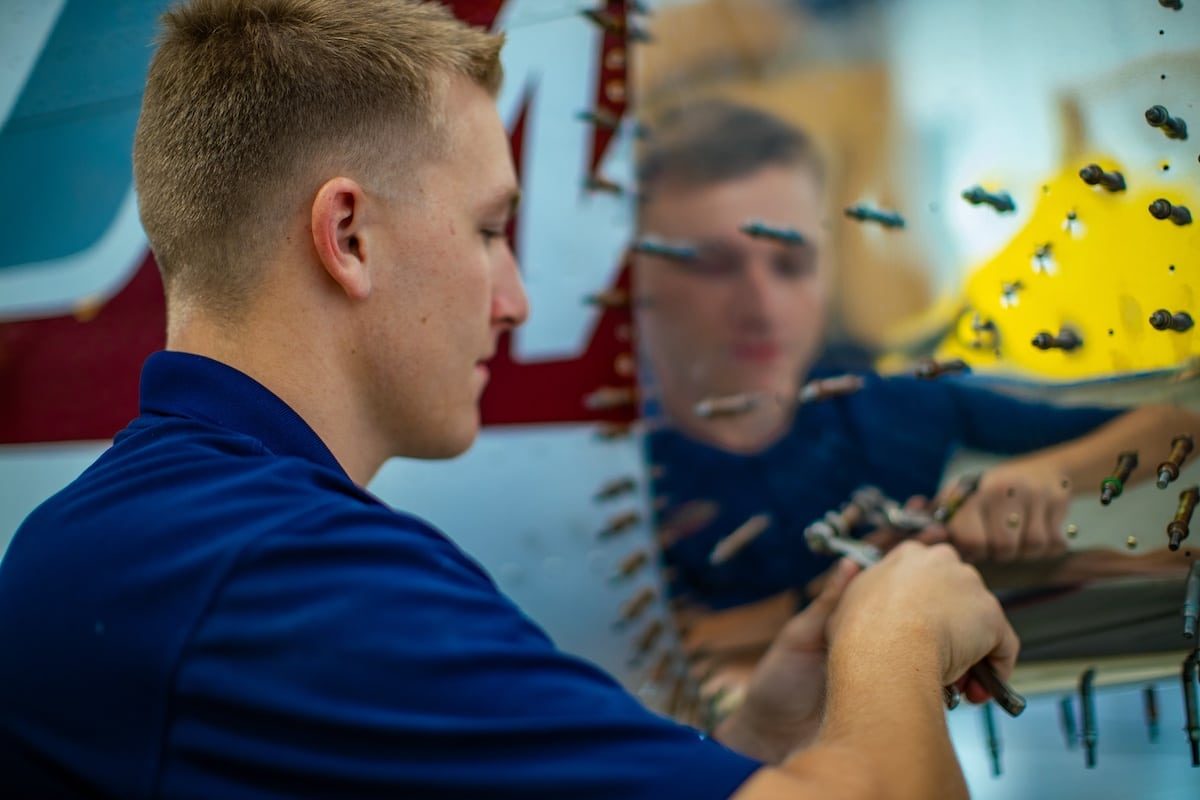 Dawson Aircraft technicians performing aircraft repair, Clinton AR